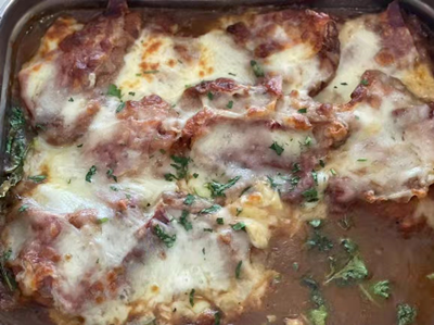 Chicken Saltimbocca - Prosciutto, Mozzarella, over Chopped Spinach